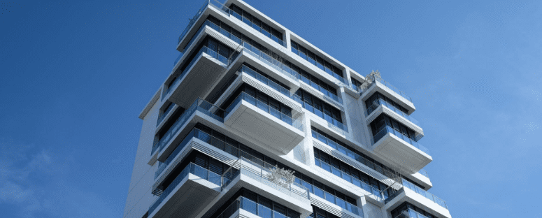 a low-angle shot of a tall building